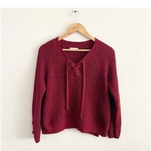It's Our Time Red V-Neck Sweater with Lace-Up Detail